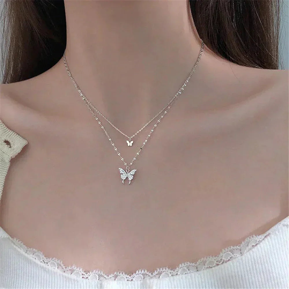 Refined silver necklace with glittering butterfly